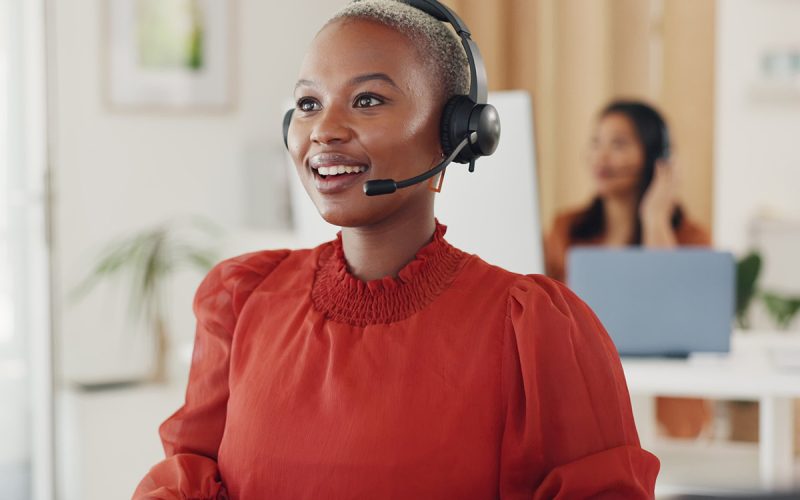 a woman wearing a wireless headset.